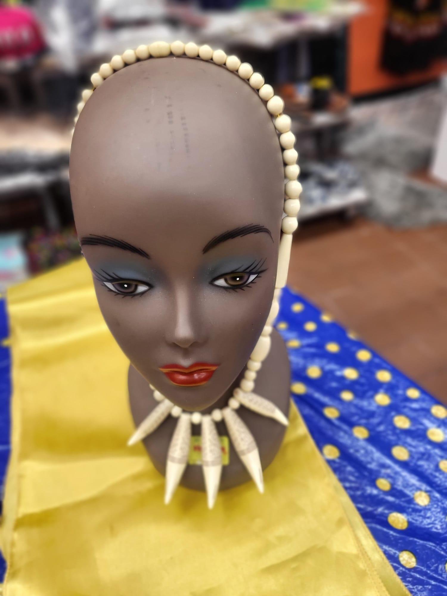 Handcrafted Tribal Beaded Necklace with Carved Spikes